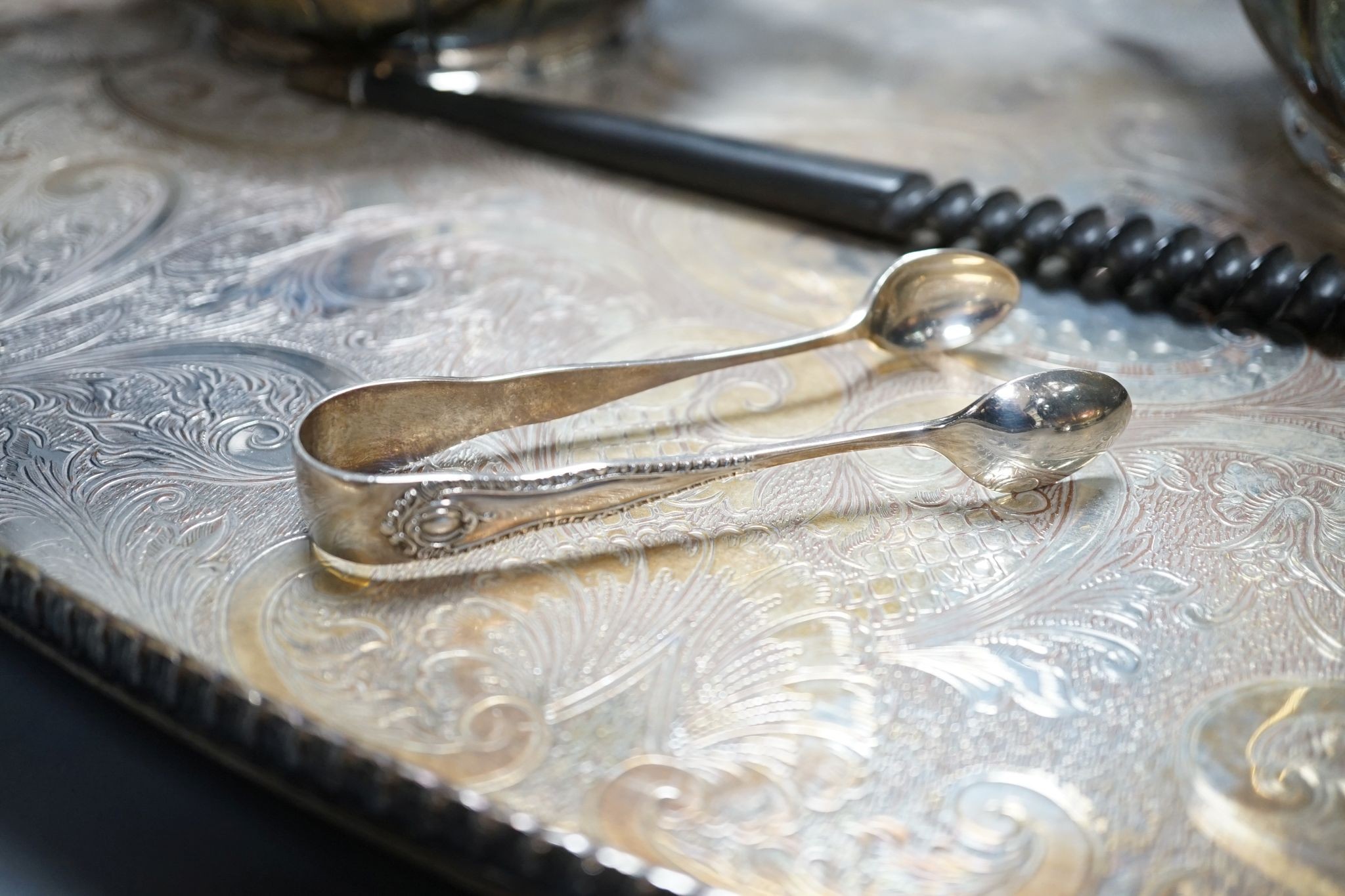 A four piece plated tea set and tray